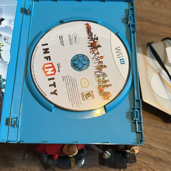 Wii U  disney infinity base portal with game and figures. - Picture 2 of 2